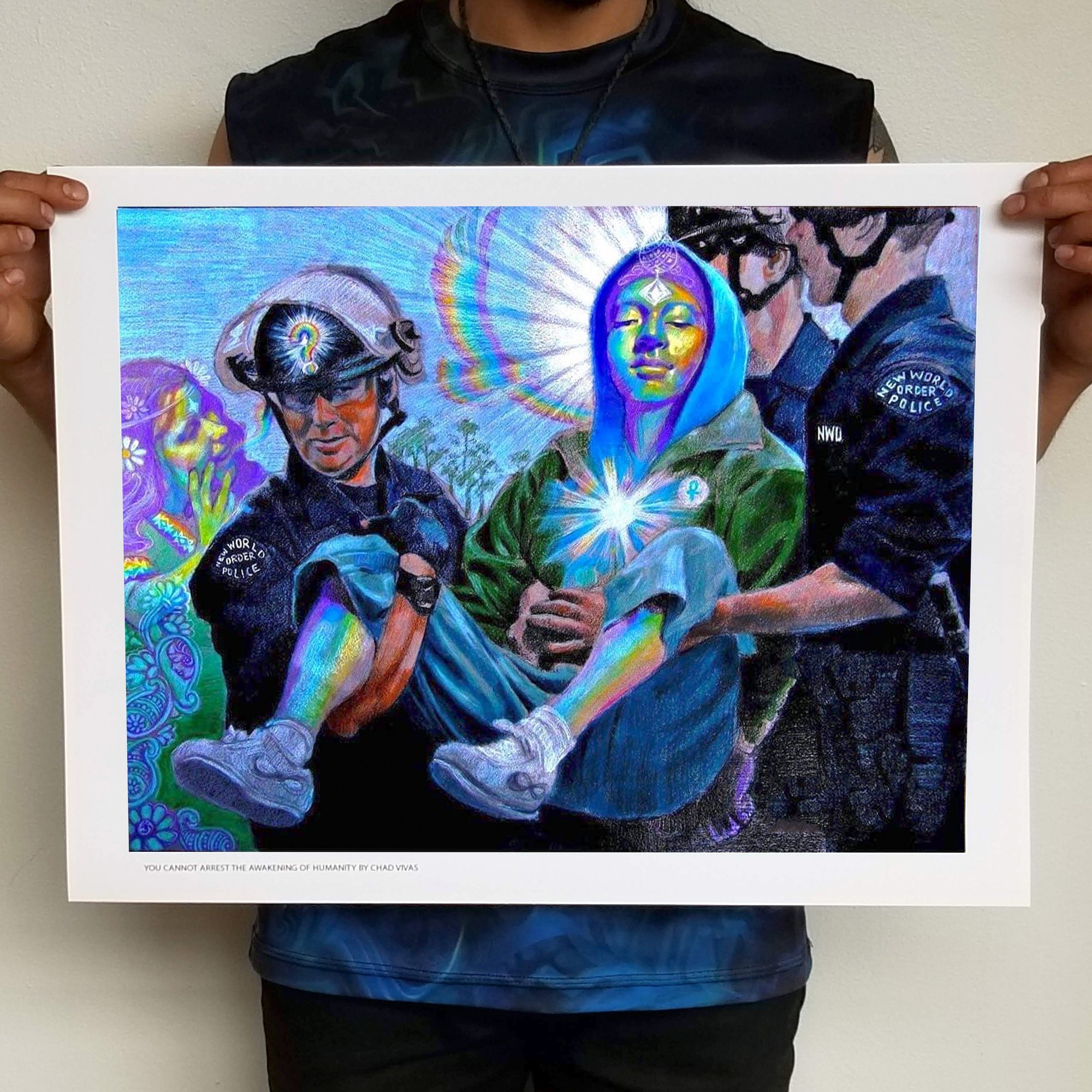 The meme is a picture of a police officer carrying a woman in a hijab, with the caption "You can't arrest the awakening of humanity". The image is a play on the idea of police officers trying to restrain or arrest someone who is awakening to a new level of consciousness or awareness, implying that they cannot be arrested or controlled.
